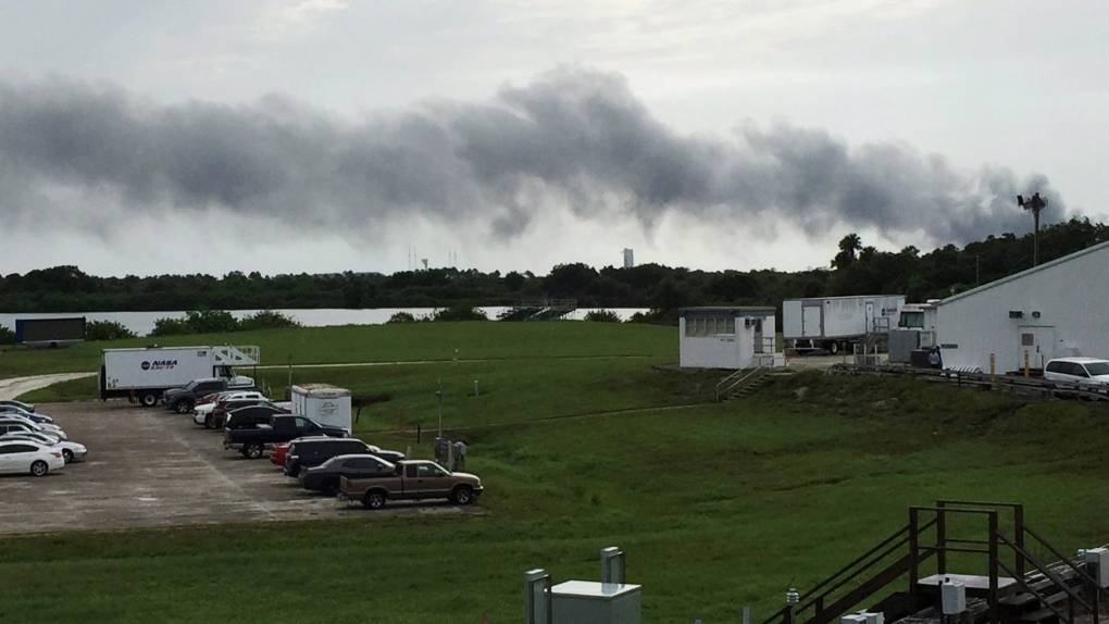Smoke rises from a SpaceX launch site