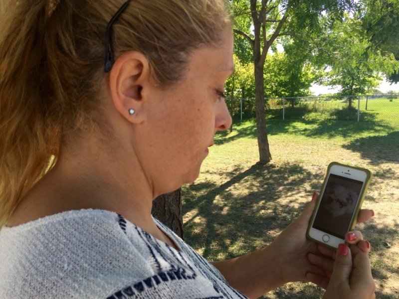 Gina Bourque is devastated after she claims a Bullmastiff killed her Shih Tzu puppy at Ford Test Track in Windsor, Ont. (Alana Hadadean / CTV Windsor)