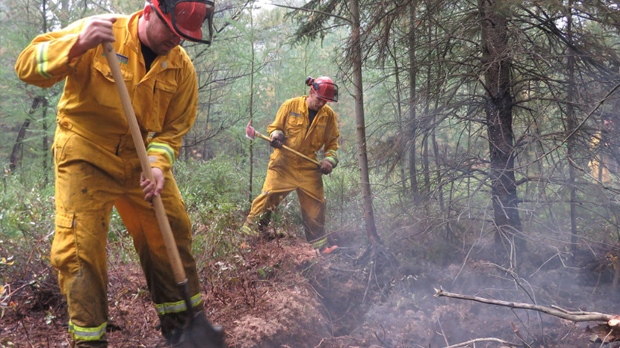 Crews work to extinguish peat fire