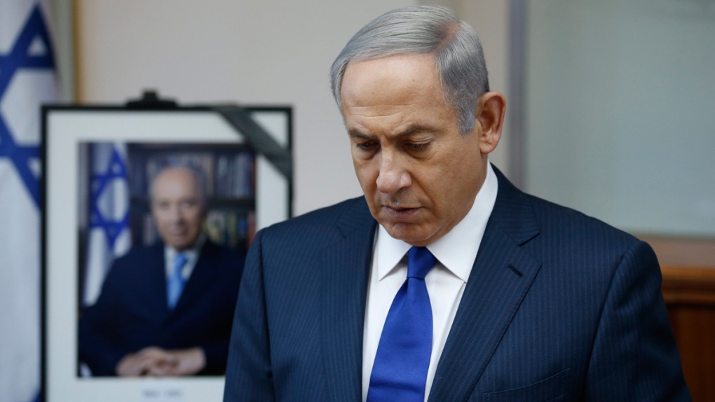 Netanyahu observes moment of silence for Peres