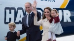 The Duke and Duchess of Cambridge along with their children Prince George and Princess Charlotte get on a float plane as they prepare to depart Victoria, B.C. Saturday, Oct. 1, 2016. (THE CANADIAN PRESS / Jonathan Hayward)