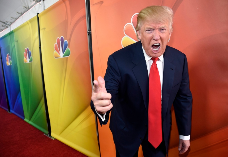 In this Jan. 16, 2015 file photo, Donald Trump, host of the reality television series 'The Celebrity Apprentice,' poses for photographers at the NBC 2015 Winter TCA Press Tour in Pasadena, Calif. (Photo by Chris Pizzello/Invision/AP, File)