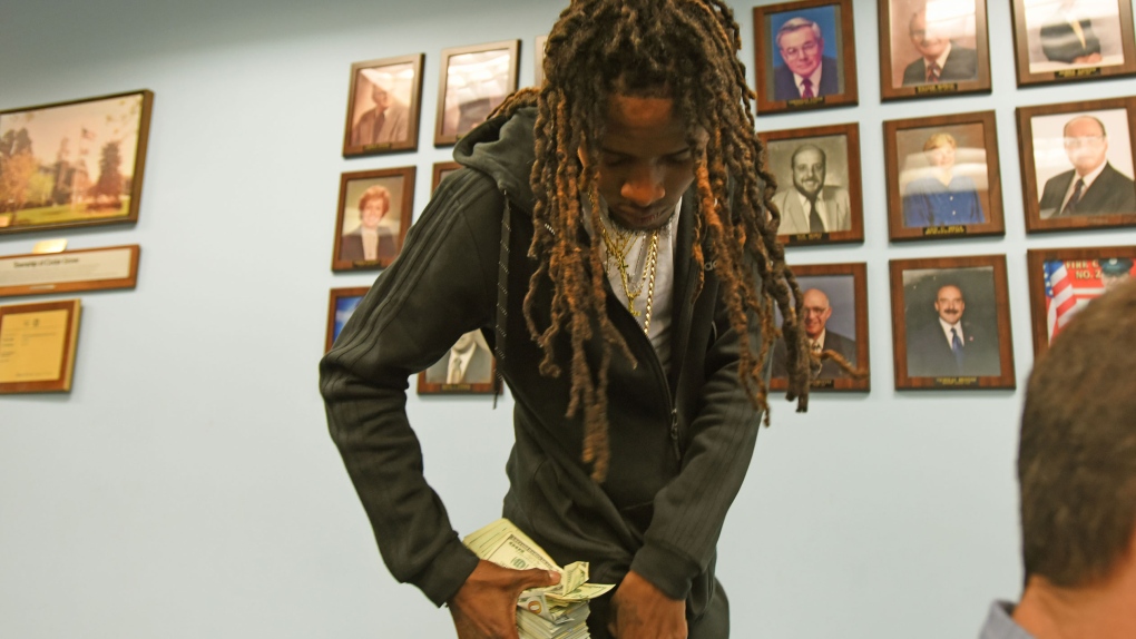 Rapper Fetty Wap brings $165K cash