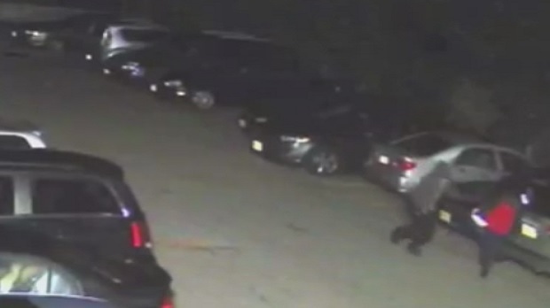 This still photo was taken from a security camera video released by police. It shows a suspect attacking a man in a Scarborough parking lot in September.