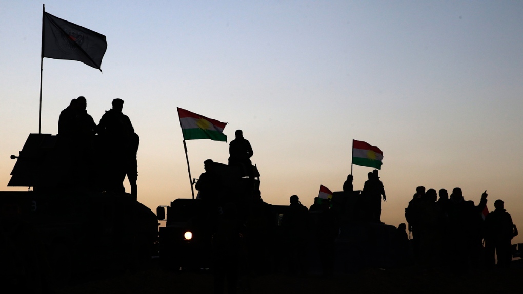 Kurdish Peshmerga fighters advance toward Mosul