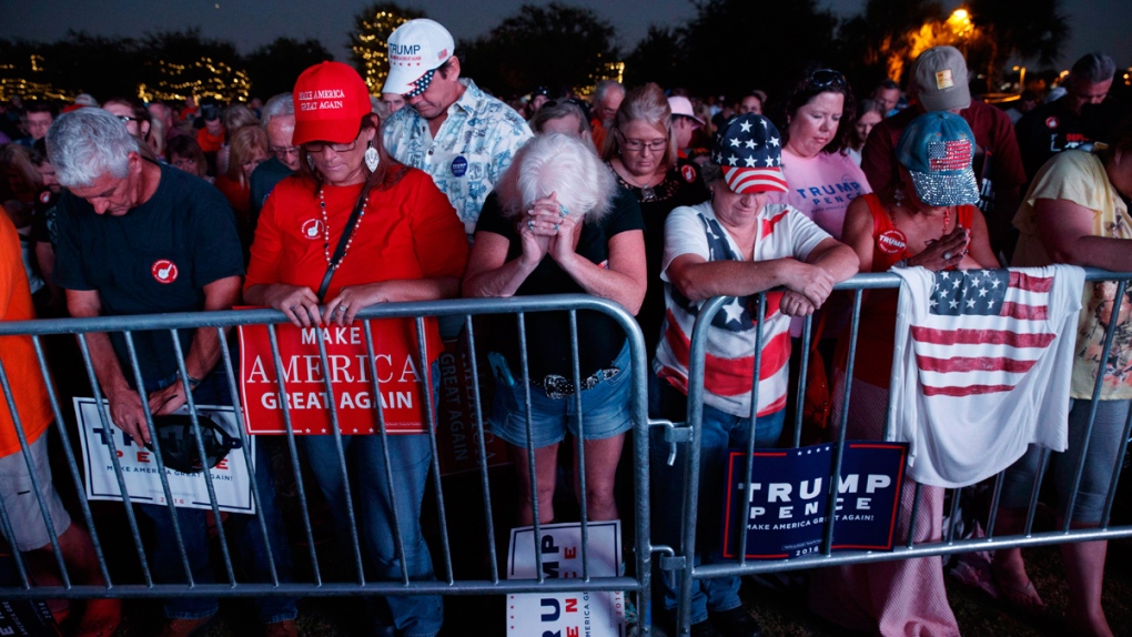 Trump supporters pray in Panama City, Fla.