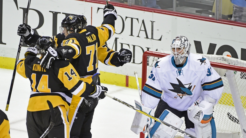Penguins rally to beat Sharks