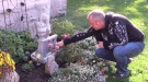 Rodney Stafford tends to a memorial for his daughter Victoria, at his home in Woodstock, Ont. on Sunday, Oct. 23, 2016.
(Twitter / Natalie Quinlan)