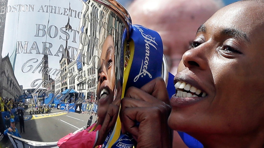 Rita Jeptoo after winning the 2013 Boston Marathon