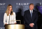 Republican presidential candidate Donald Trump listens as his daughter Ivanka Trump speaks during the grand opening of Trump International Hotel in Washington, Wednesday, Oct. 26, 2016. (AP / Manuel Balce Ceneta)