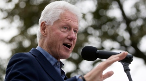 A 2011 confidential memo written by a longtime Bill Clinton aide during Hillary Clinton's State Department tenure describes overlap between the former president's business ventures and fundraising for the family's charities. (John Minchillo / The Associated Press)