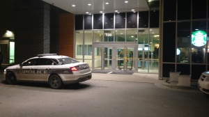 A police cruiser remained outside Health Sciences Centre Sunday night where shots were fired inside a hotel.