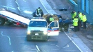 Emergency crews work to clear the scene of a fatal crash on the Gardiner Expressway near Parkside Drive. (CP24)