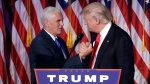 President-elect Donald Trump shakes hands with Vice President-elect Mike Pence as he gives his acceptance speech during his election night rally, Wednesday, Nov. 9, 2016, in New York. (John Locher/AP Photo)