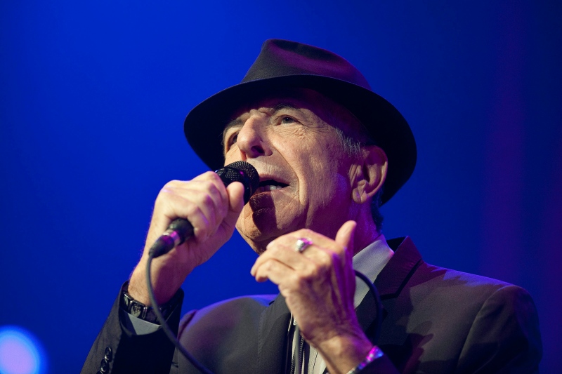 In this picture made available Friday, July 5, 2013, Canadian singer Leonard Cohen performs on the Auditorium Stravinski during the first day of the 47th Montreux Jazz Festival, in Montreux, Switzerland, Thursday, July 4, 2013. (AP / Keystone, Sandro Campardo)