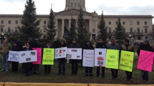 Several dozen protesters gathered in front of the Manitoba legislature carrying signs reading “Minorities are humans too” and “Save humanity, save Bangladesh.” (Photo: Lizzy Symons/CTV Winnipeg)