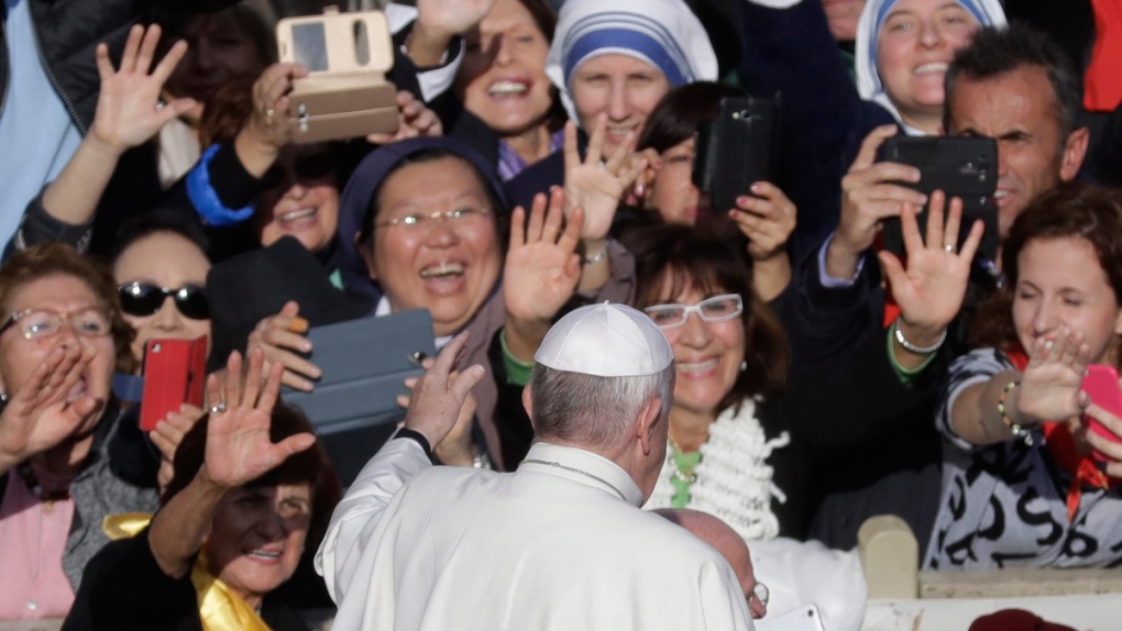 Pope Francis greets faithful at the Vatican