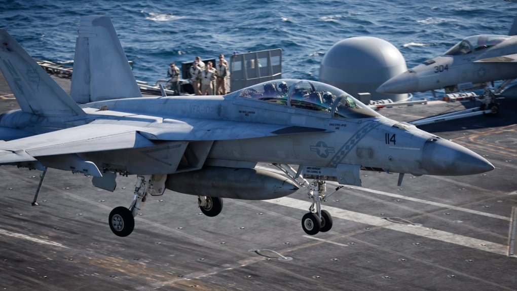 A U.S. Navy F/A-18 Super Hornet fighter lands