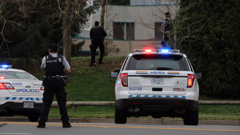 Mounties respond to a reported threat at Enver Secondary School in Surrey, B.C. on Nov. 24, 2016. (CTV)
