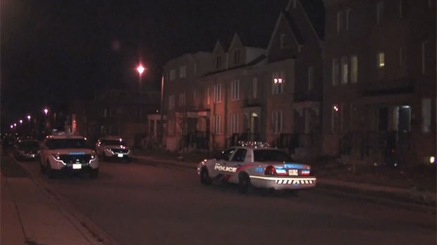 One person is in custody after a man was slashed inside a rooming house near York University. 