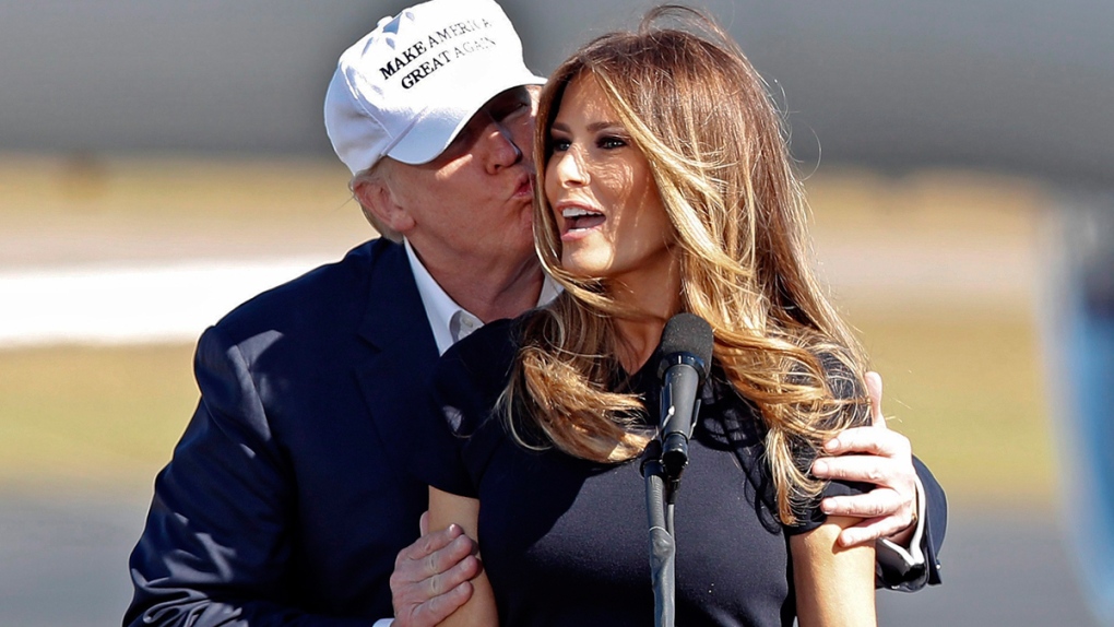 Donald Trump kisses his wife Melania