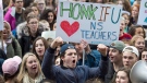 Students from Citadel High School protest outside the legislature in Halifax on Friday, Dec. 2, 2016. Students across the province expressed their support for teachers after contract talks between the Nova Scotia Teachers Union and the province broke down. (THE CANADIAN PRESS/Andrew Vaughan)
