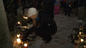 A vigil was held to remember female victims of violence at Minto Park in Ottawa, Dec. 6, 2016