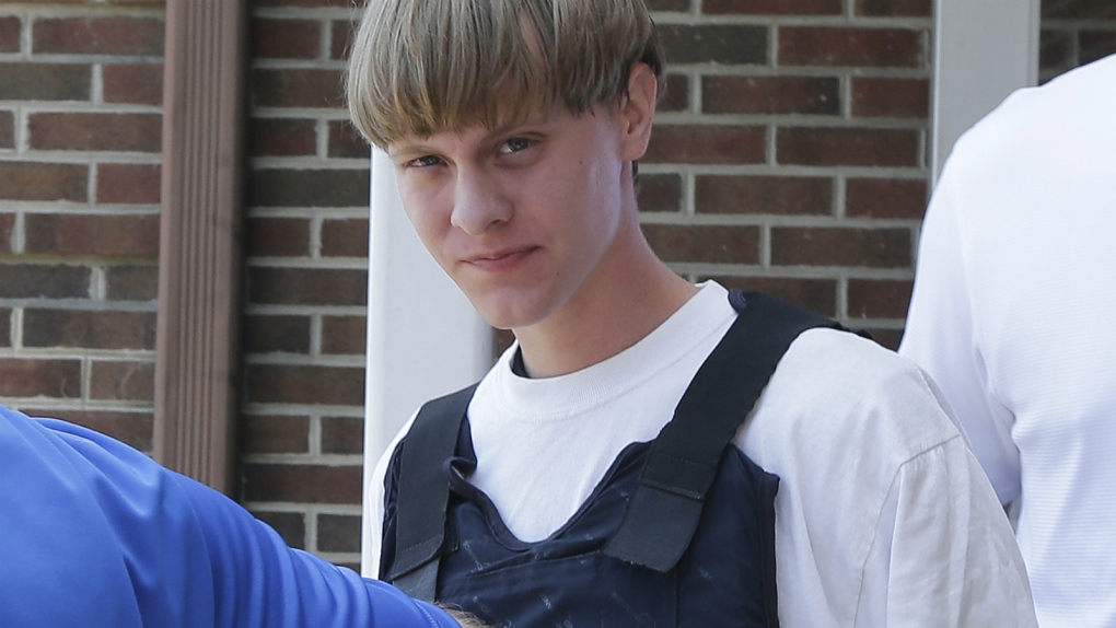 Dylann Roof leaves a North Carolina police station