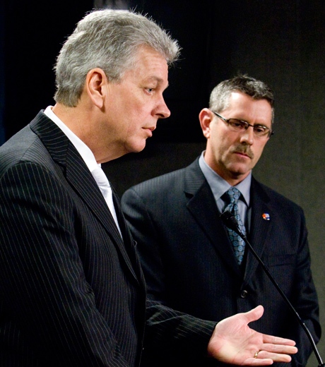 Canadian Association of Chiefs of Police Vice-President Chief Tom Kaye, of the Owen Sound police service (left) responds to a question as President of the Canadian Police Association Charles Momy looks on during a news conference on Parliament Hill in Ottawa Tuesday Feb. 24, 2009. (THE CANADIAN PRESS / Adrian Wyld)