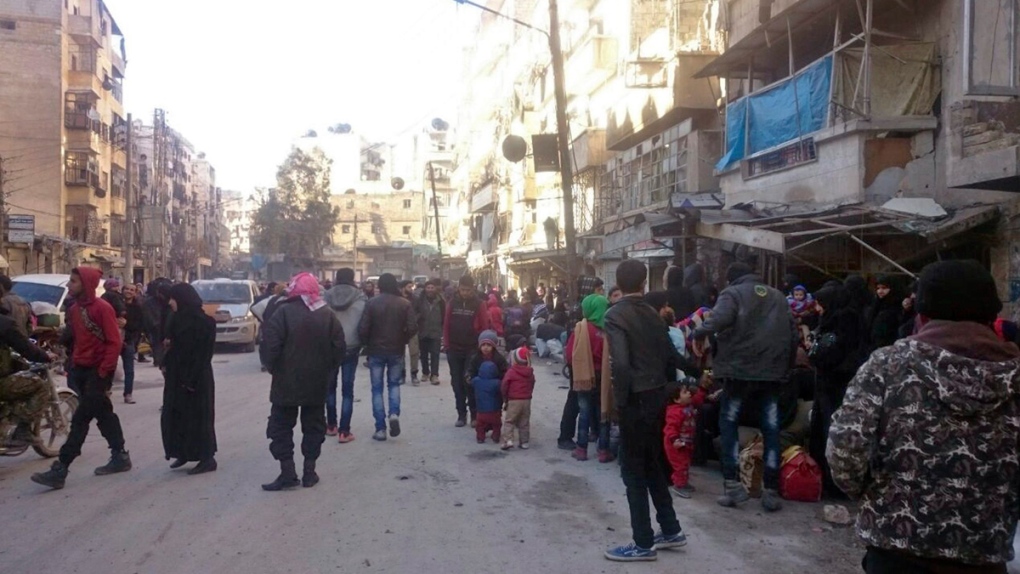 Eastern Aleppo residents wait to be evacuated