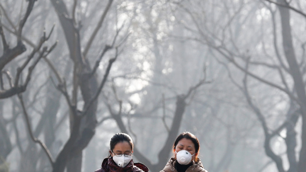 Ritan Park shrouded by dense smog in Beijing