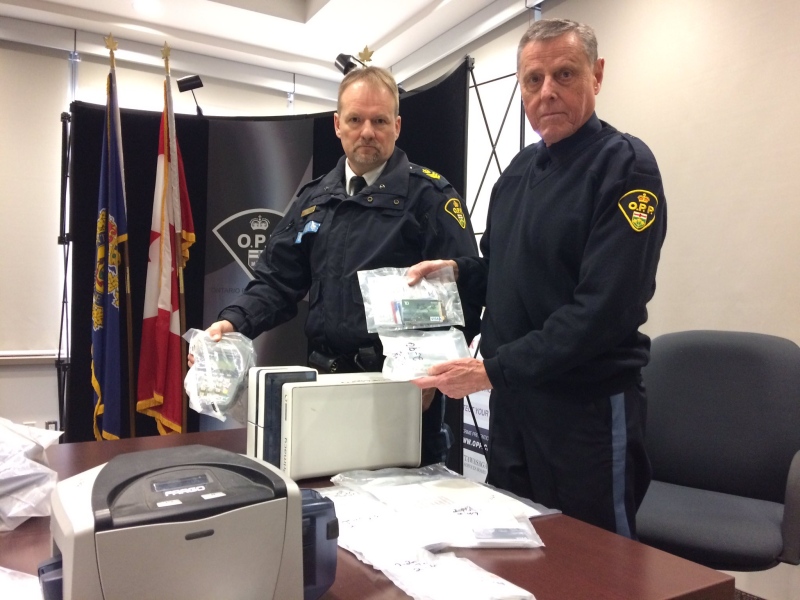 Nottawasaga OPP hold credit cards seized in a large bust in New Tecumseth, Ont. on Wedneday, Dec. 21, 2016. (Mike Walker/ CTV Barrie)