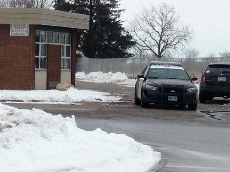 OPP investigate a threat written on a wall at Harrow Public School on Dec. 22, 2016. (Chris Campbell/CTV)