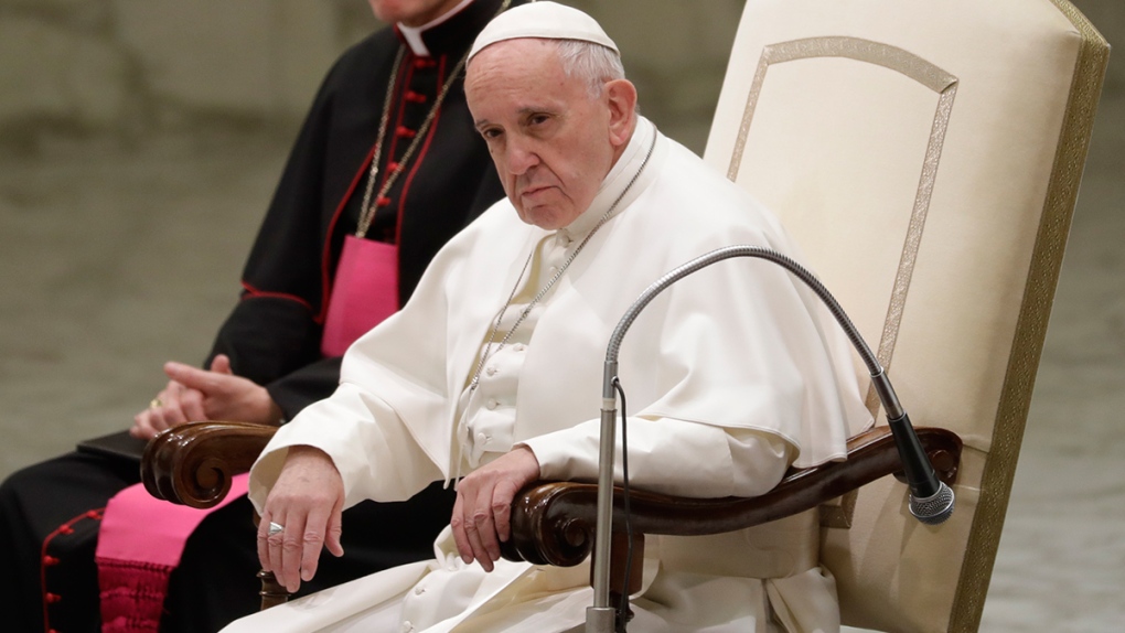 Pope Francis sits during his weekly audience