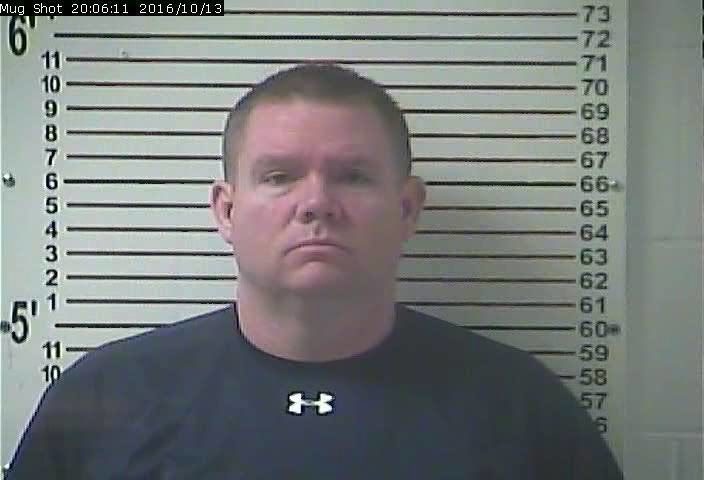 This Oct. 13, 2016 booking image released by the Hardin County Detention Center, shows Stephen Kyle Goodlett, the former principal of LaRue County,Ky. High School. (Hardin County Detention Center via AP)