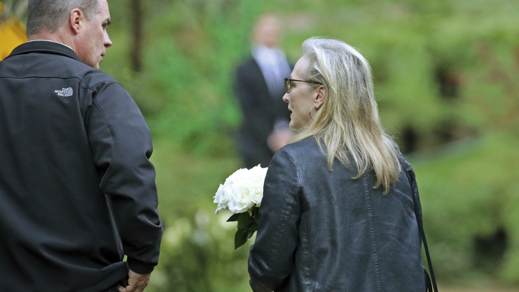 Meryl Streep arrives at memorial for Carrie Fisher