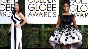 Julia Louis-Dreyfus, left, and Janelle Monae arrive at the 74th annual Golden Globe Awards at the Beverly Hilton Hotel on Sunday, Jan. 8, 2017, in Beverly Hills, Calif. (Photo by Jordan Strauss/Invision/AP)