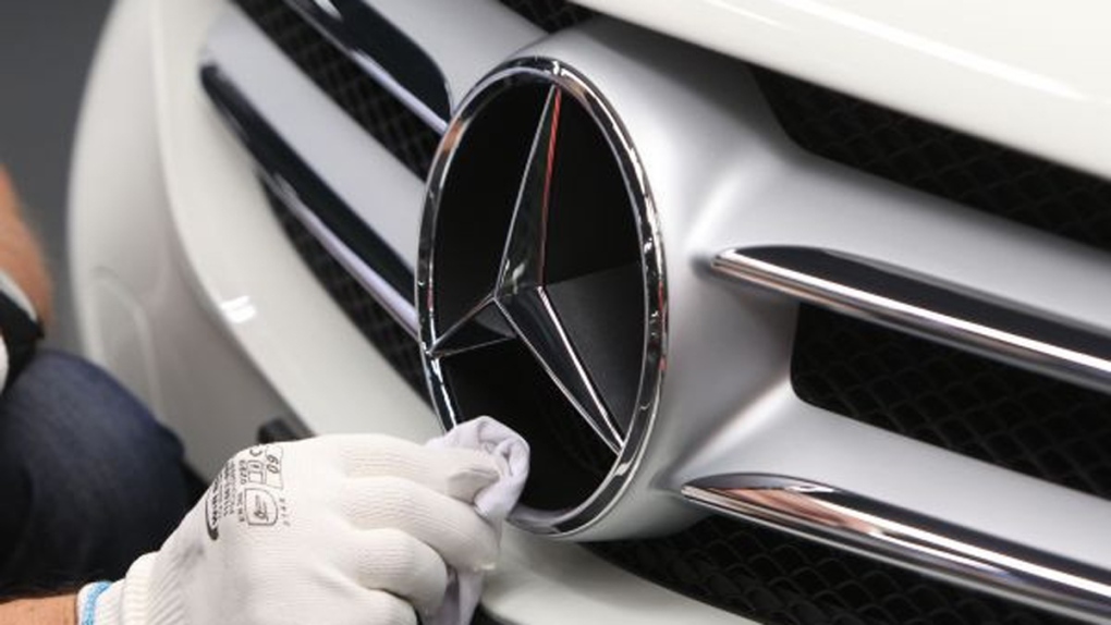 Polishing a Mercedes-Benz emblem