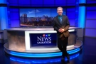 Long-time news anchor Rob MacDonald poses at the CTV Saskatoon desk during his final week with the station. He's retiring after nearly 41 years with CTV Saskatoon.