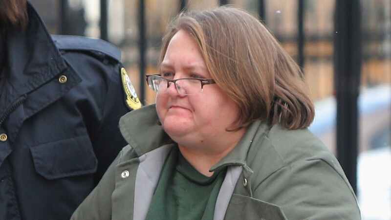 Elizabeth Wettlaufer is escorted into the courthouse in Woodstock, Ont. on Jan. 13. (Dave Chidley/The Canadian Press)
