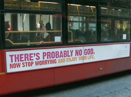 An ad on the side of the bus questions the existence of God.
