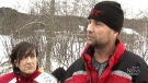 Kevin Wiseman rescued his wife from a frozen lake after their trail groomer crashed through the ice.  