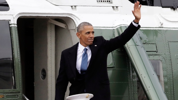 Former President Barack Obama departs the Capitol