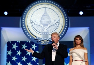 President Donald Trump talks as first lady Melania Trump listens at the Freedom Ball, Friday, Jan. 20, 2017, in Washington. (AP / Alex Brandon)