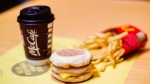 A McDonald's Egg McMuffin, french fries and a coffee are shown in a handout photo. (THE CANADIAN PRESS/HO-McDonald's Canada)
