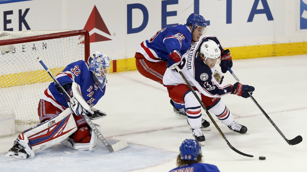 Cam Atkinson tries to score against the Rangers