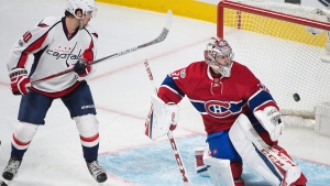 Montreal Canadiens goaltender Carey Price is scored on by Washington Capitals' Nicklas Backstrom as Capitals Marcus Johansson, left, looks for a rebound during third period NHL hockey action in Montreal, Saturday, February 4, 2017. THE CANADIAN PRESS/Graham Hughes
