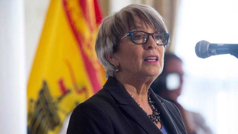 New Brunswick Finance Minister Cathy Rogers addresses media after officially releasing the 2017-2018 provincial budget in Fredericton, N.B., on Tuesday, February 7, 2017. (THE CANADIAN PRESS/James West)