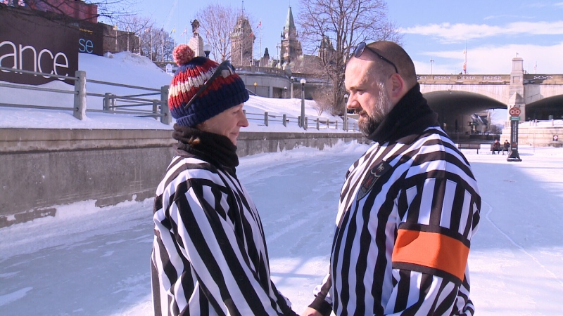 Alice Stanley (left) and Roy Hamilton, both hockey referees from the United Kingdom, tied the knot on the Rideau Canal Skateway on Wednesday. (Jamie Karam/CTV Ottawa, February 8, 2017) 