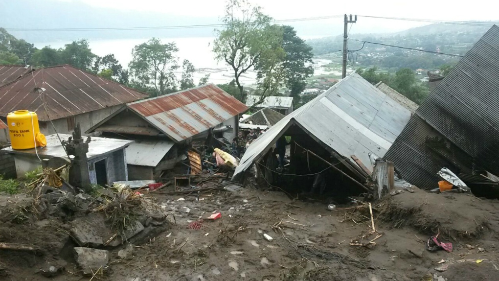 Landslides bury homes in Bali